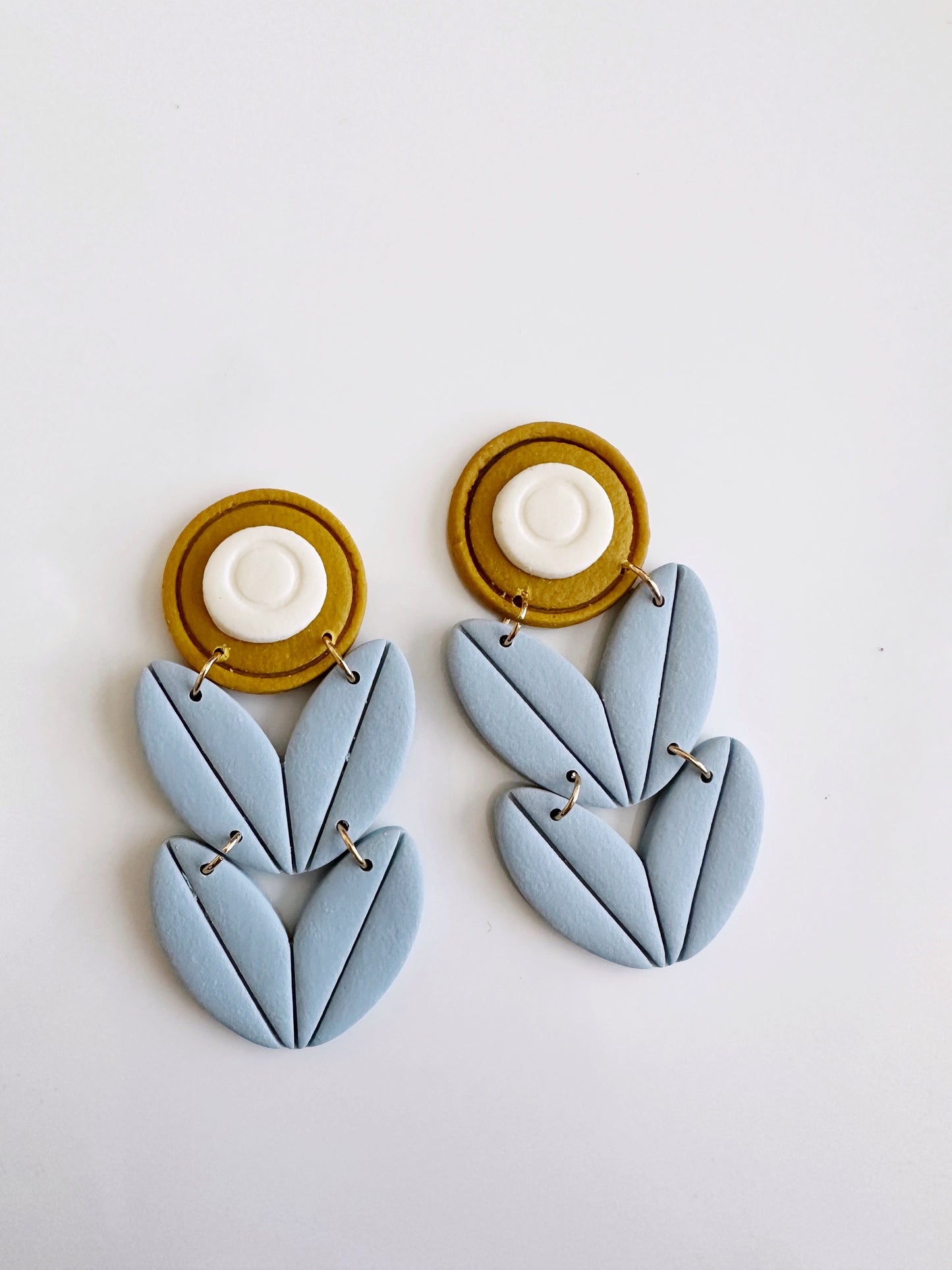 dusty blue, sunflower yellow Scandinavian style flower earring with double stack of leaves