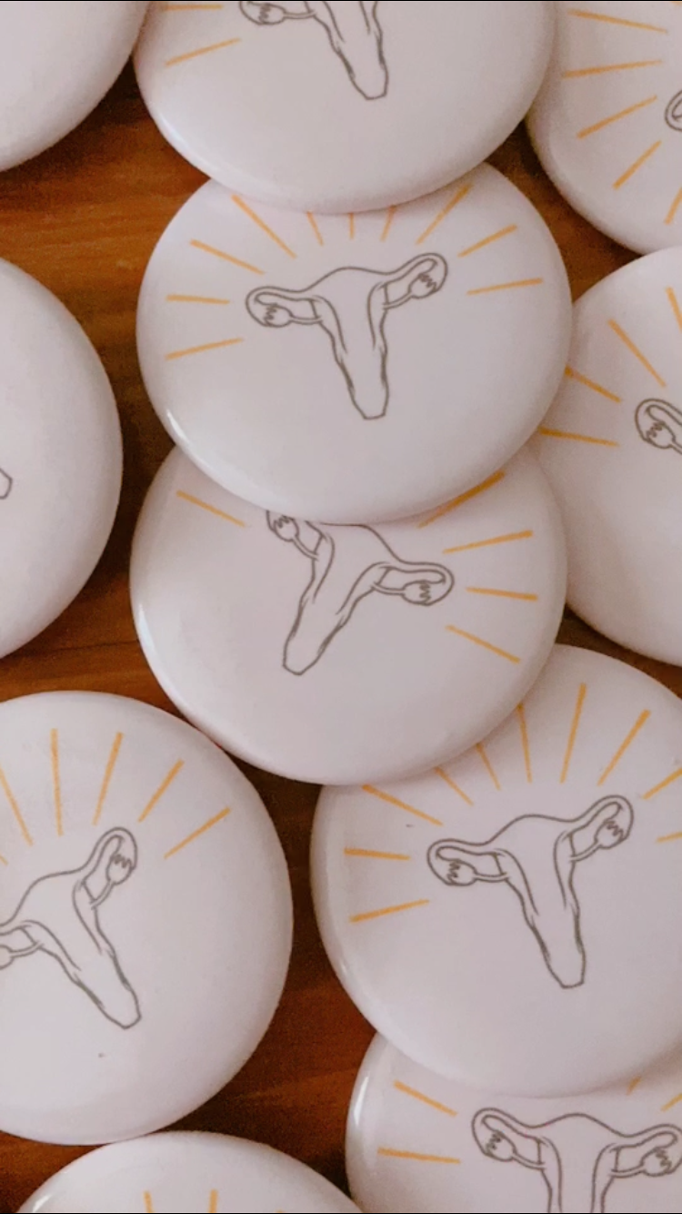 feminist art pink female uterus power button pin